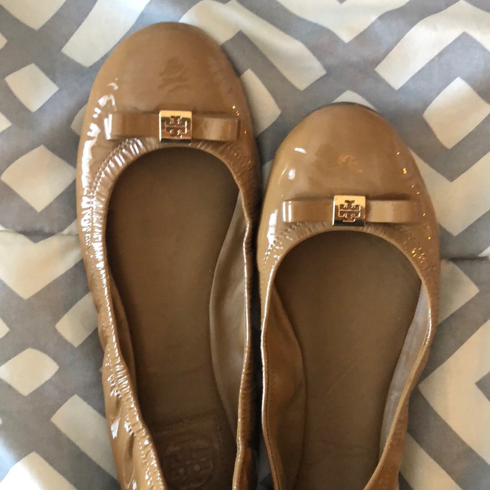 Light brown Tory Burch flats.